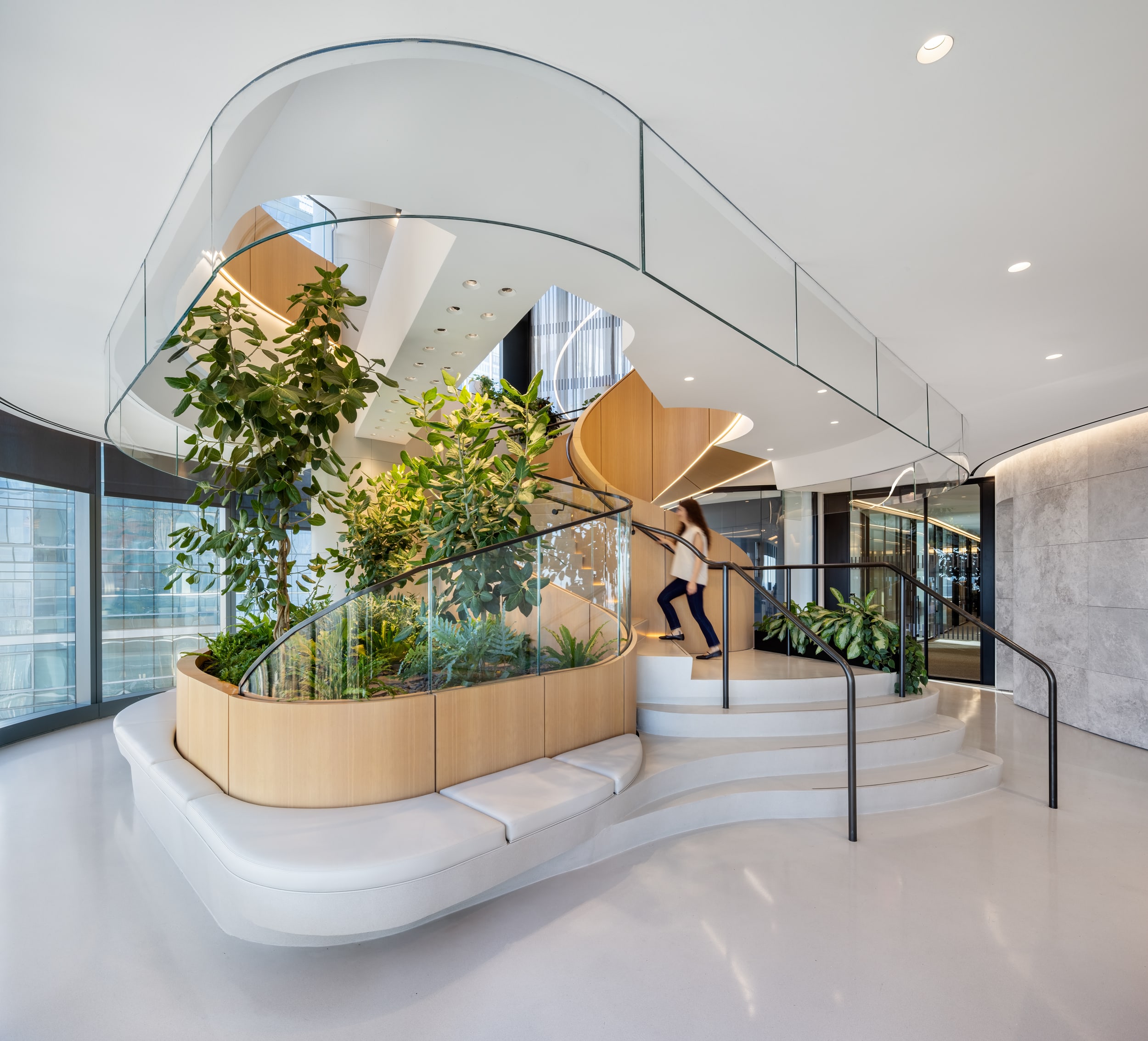Custom interior plantscaping design and installation for a commercial interior by Greenery NYC